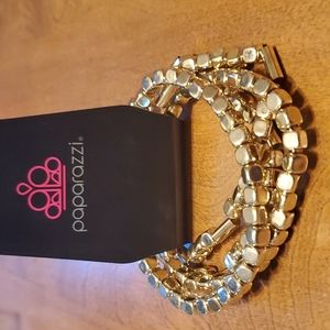 Paparazzi NWT set of four gold stretch bracelets.